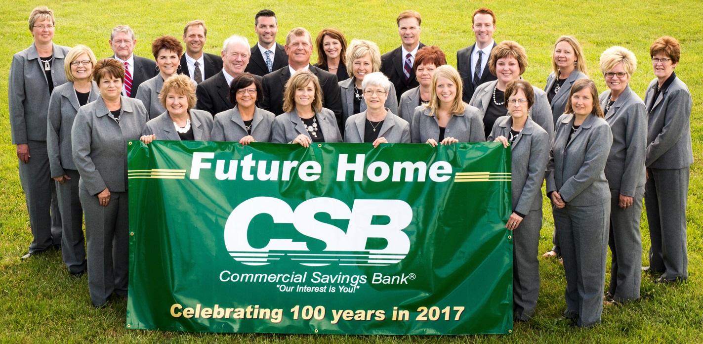Employee group photo with CSB 100 Year Banner