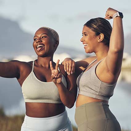 Two women working out,